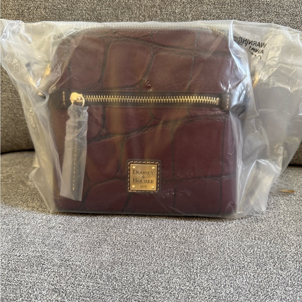 Brand new, Dooney & Bourke Denison Domed Crossbody in Bordeaux, with tags!